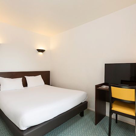 อะดาโจ แอคเสส ดีเฟนส์ วินซี อพาร์ตโฮเต็ล Aparthotel กูร์เบอวัวร์ ภายนอก รูปภาพ