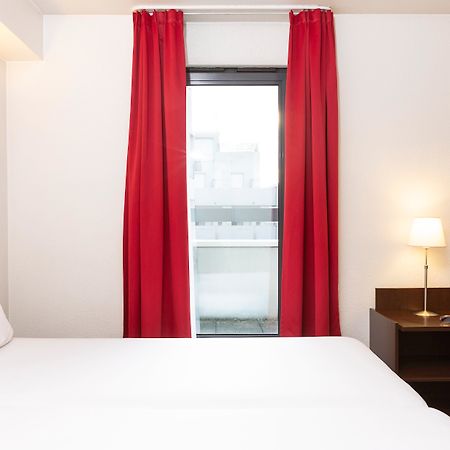 อะดาโจ แอคเสส ดีเฟนส์ วินซี อพาร์ตโฮเต็ล Aparthotel กูร์เบอวัวร์ ภายนอก รูปภาพ