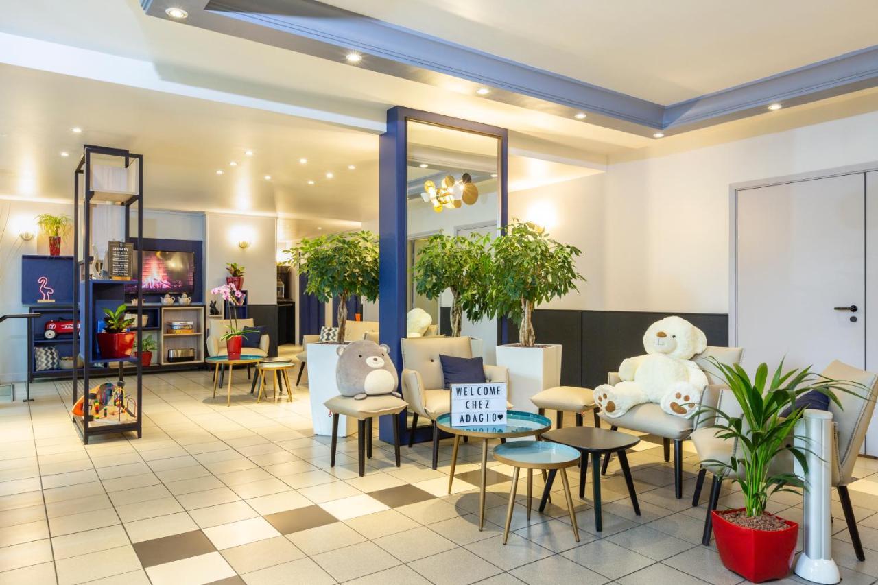 อะดาโจ แอคเสส ดีเฟนส์ วินซี อพาร์ตโฮเต็ล Aparthotel กูร์เบอวัวร์ ภายนอก รูปภาพ