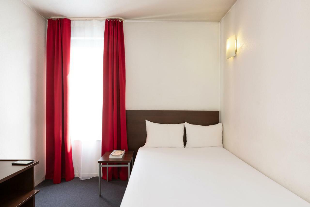 อะดาโจ แอคเสส ดีเฟนส์ วินซี อพาร์ตโฮเต็ล Aparthotel กูร์เบอวัวร์ ภายนอก รูปภาพ